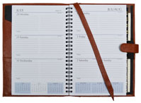 leather planner with calendar, address book and writing tablet