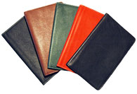 black, tan, green and red leather pocket planners